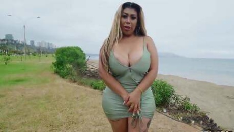 Milf with huge tits and big ass wanders around the malecon in lima Peru in need of a huge black cock.