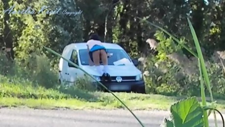 Outdoor car windows cleaning by the road